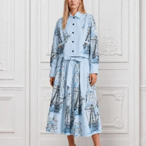 Sky-blue-shirt-and-skirt-ensemble-adorned-with-intricate-blue-sailboat-embroidery-1