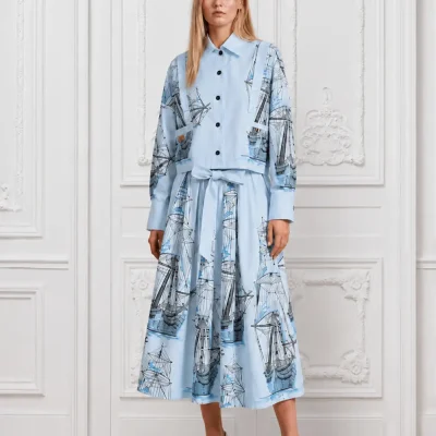 Sky-blue-shirt-and-skirt-ensemble-adorned-with-intricate-blue-sailboat-embroidery-1