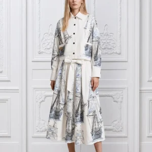 white-shirt-and-skirt-ensemble-adorned-with-intricate-blue-sailboat-embroidery-1
