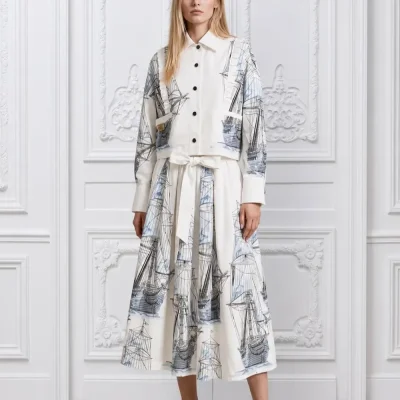white-shirt-and-skirt-ensemble-adorned-with-intricate-blue-sailboat-embroidery-1